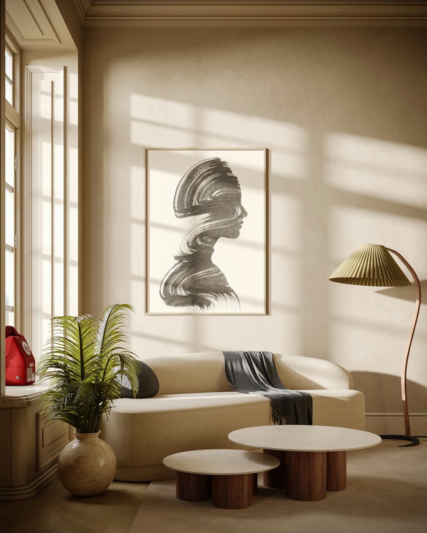 A sunlit sitting room with a cream sofa, round low tables, a floor lamp and a large monochrome portrait